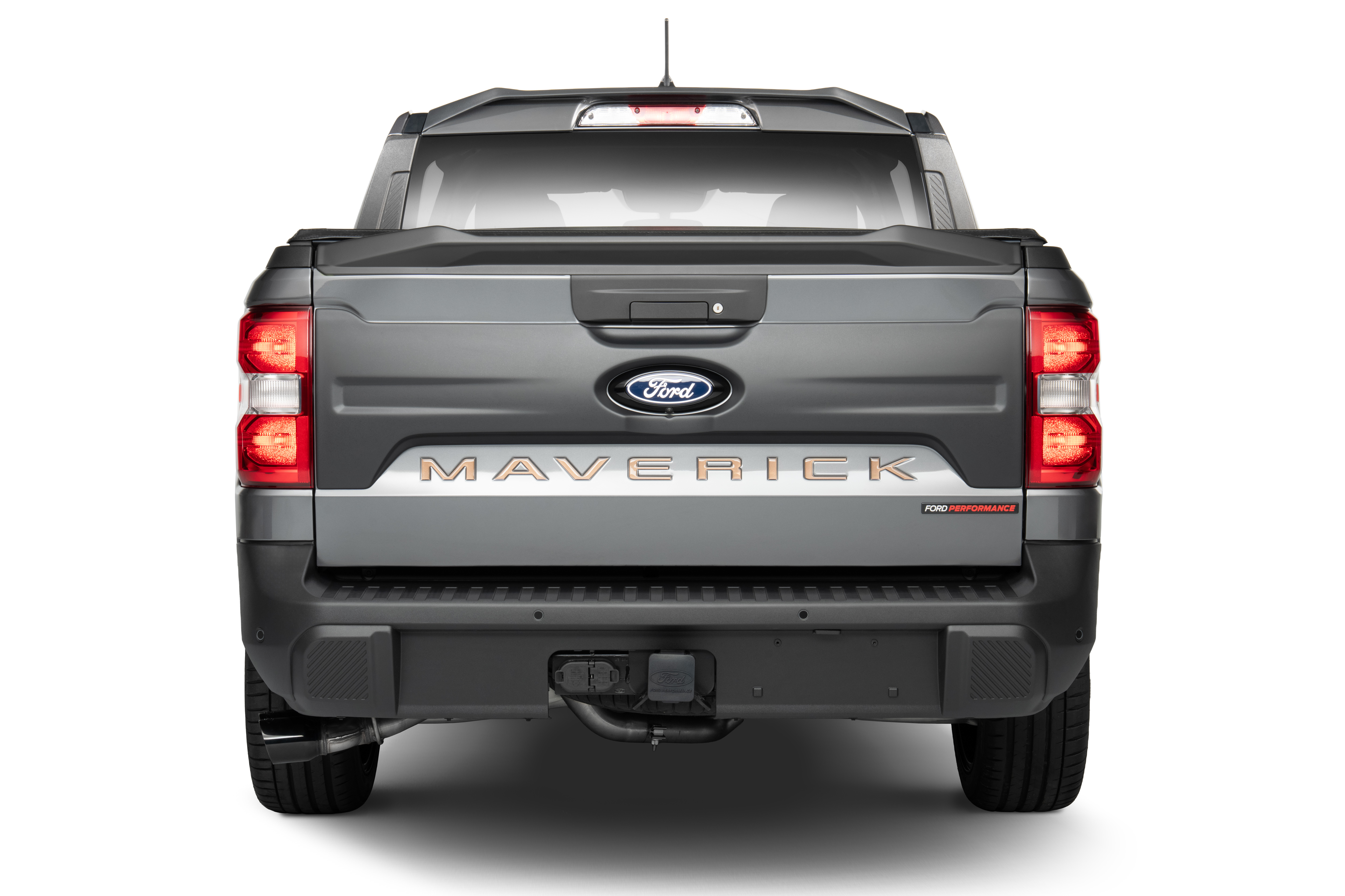 Rear shot of Ford Maverick 300T shows the word "Maverick" in bronze letters across the tailgate 